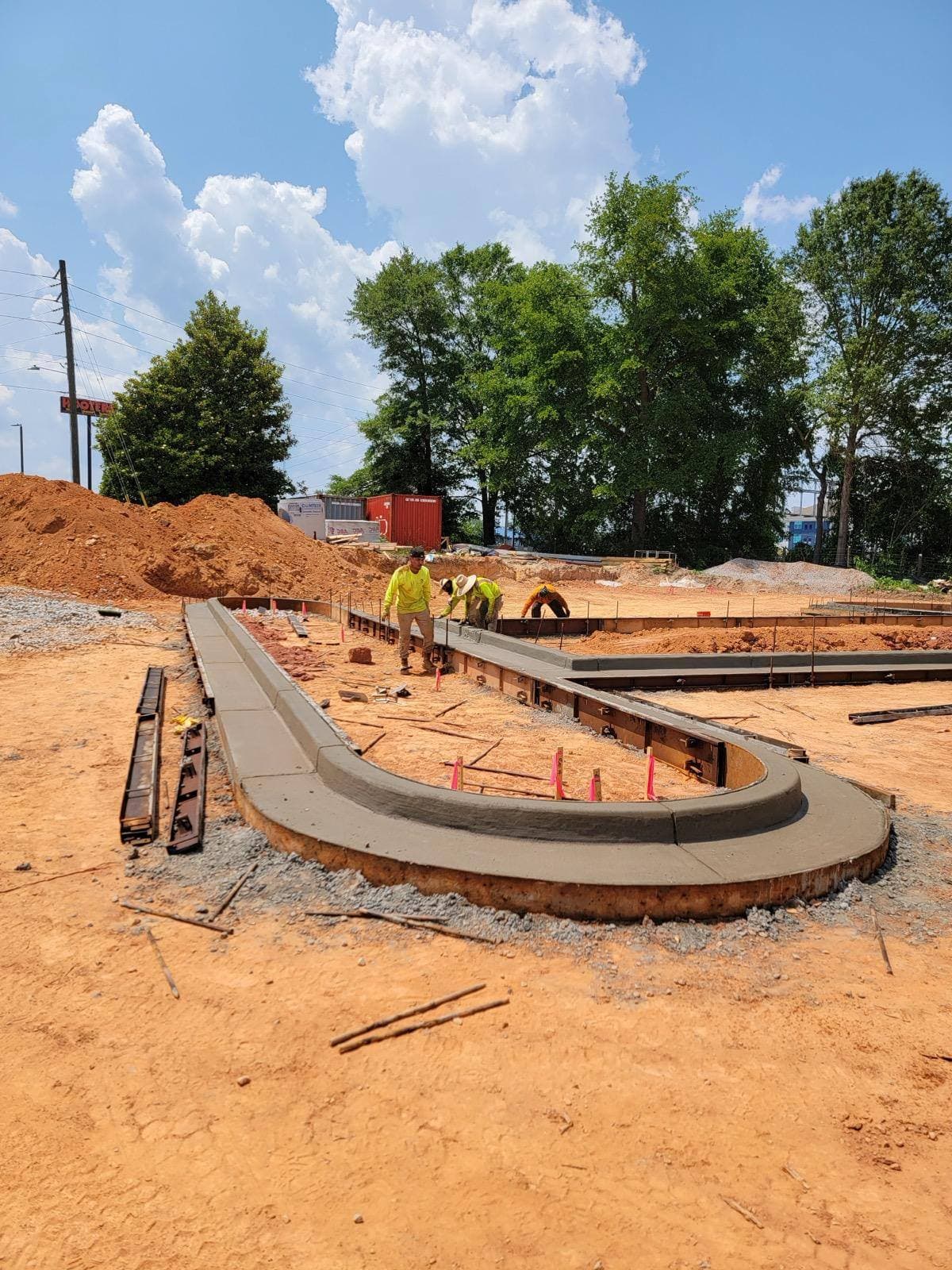 S&V crew laying commercial concrete curb
